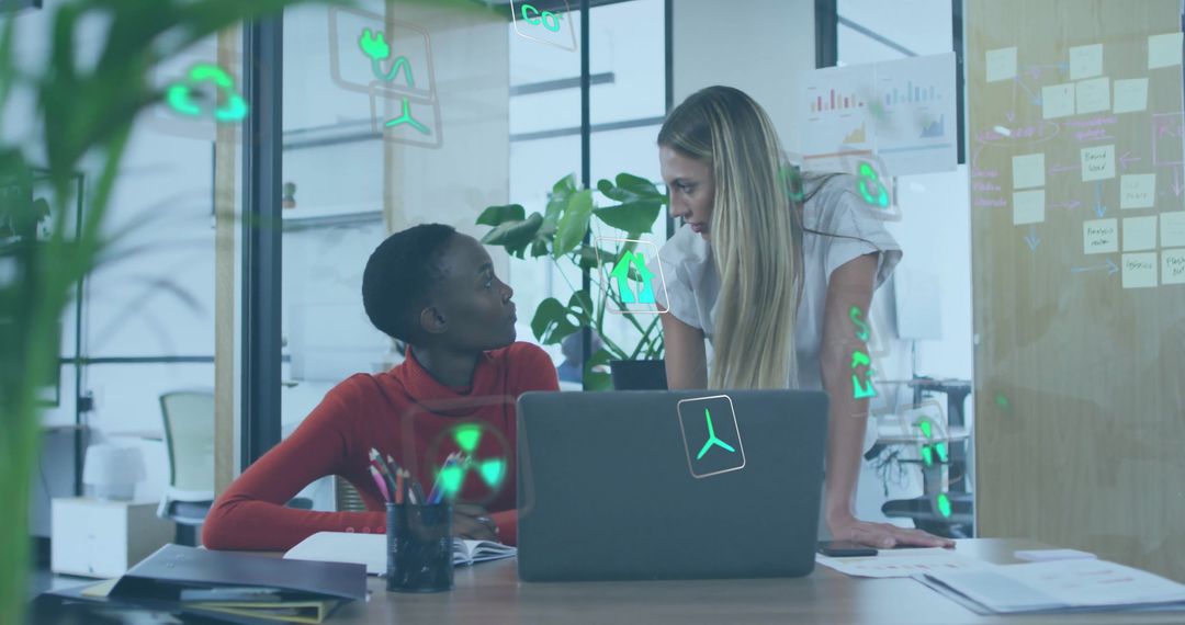 Diverse Colleagues Collaborating on Sustainable Ideas with Holographic Icons