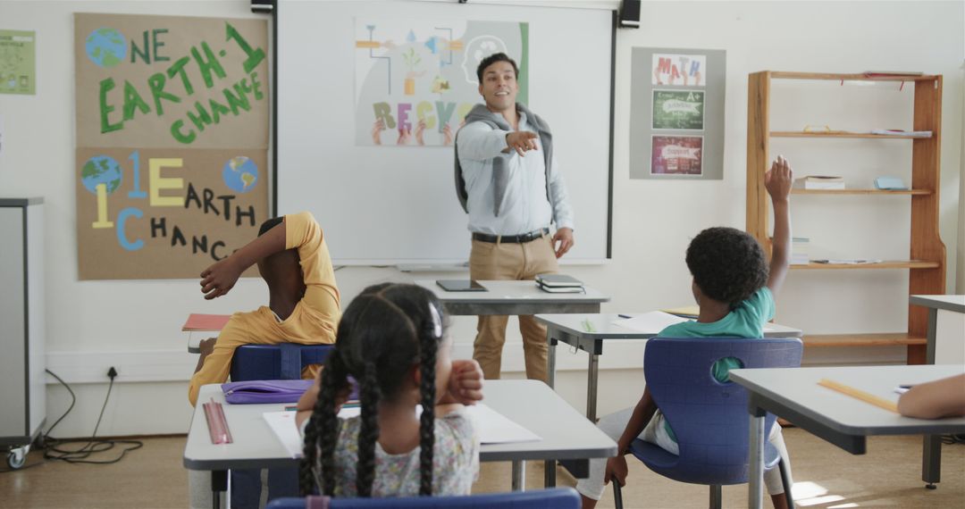 Teacher Giving Engaging Lecture in Eco-friendly Classroom - Free Images, Stock Photos and Pictures on Pikwizard.com