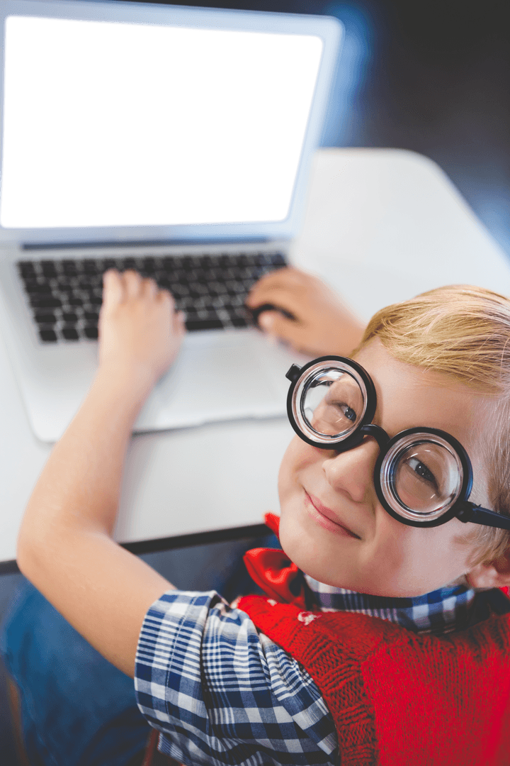 Happy Boy in Oversized Glasses with Transparent Laptop Screen