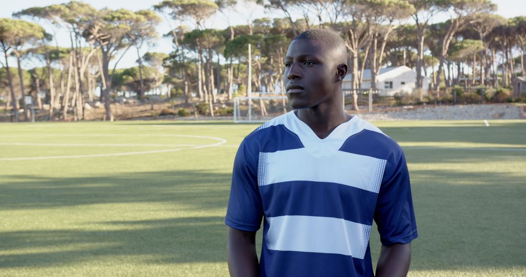 Confident Soccer Player on Artificial Turf Field