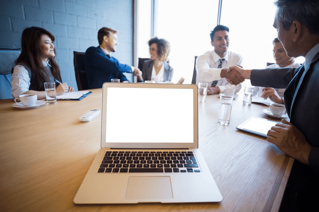 Transparent Laptop Screen in Busy Business Meeting Mockup
