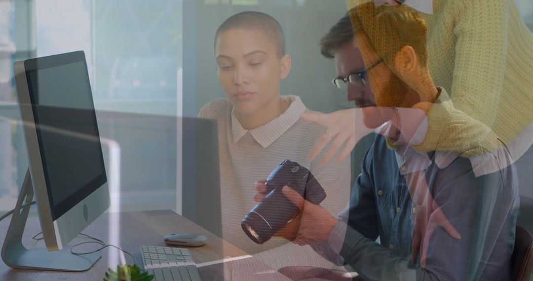 Creative Team Discussing Project with Digital Tools