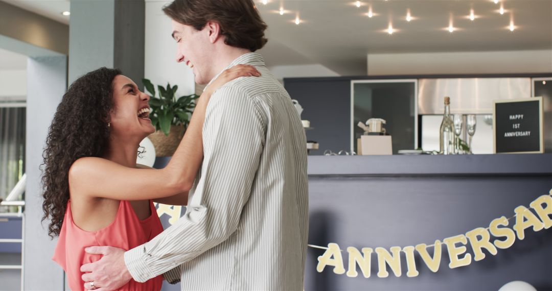 Joyful Couple Celebrating Anniversary in Modern Home