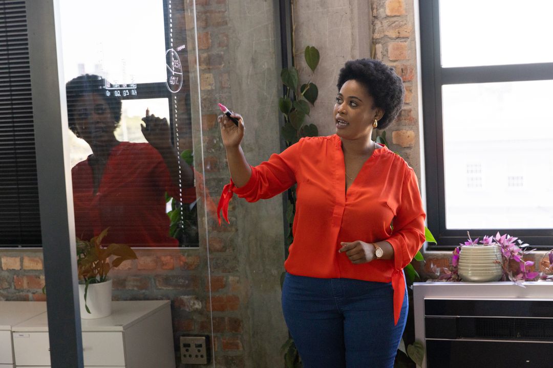 Professional Woman Brainstorming in Modern Office Space