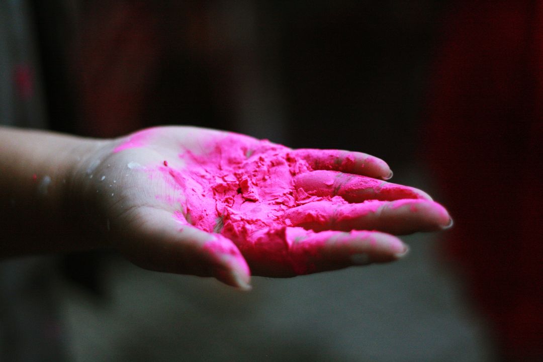 Hand Covered in Vibrant Pink Powder During Holi Festival - Free Images, Stock Photos and Pictures on Pikwizard.com