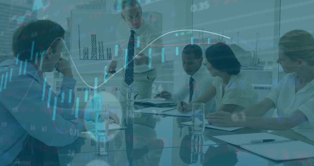 Executive Leading Data-Driven Presentation with Colleagues Around Glass Conference Table