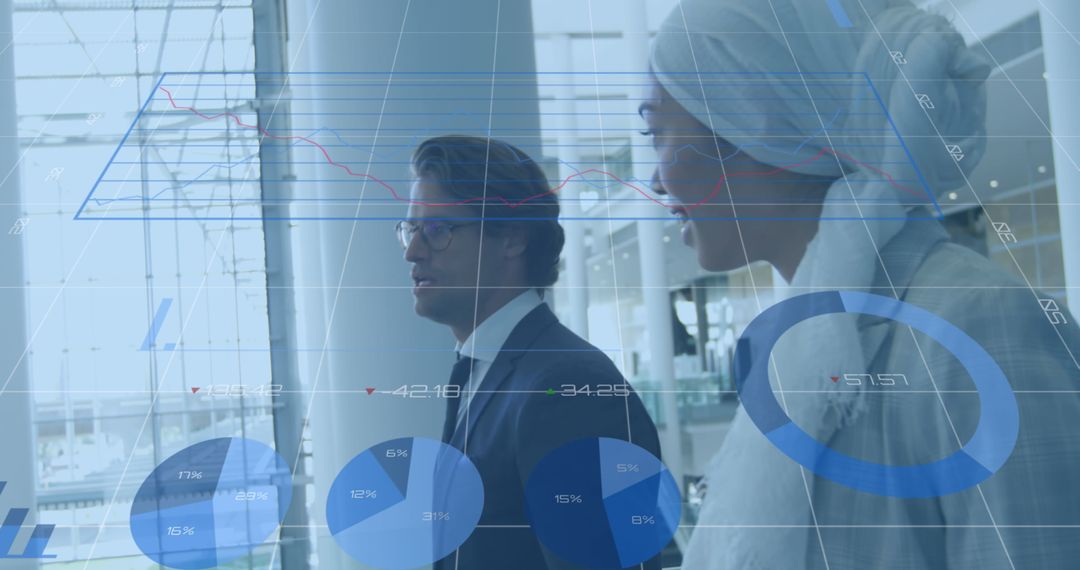 Diverse Businesspeople Analyzing Digital Financial Data Overlay