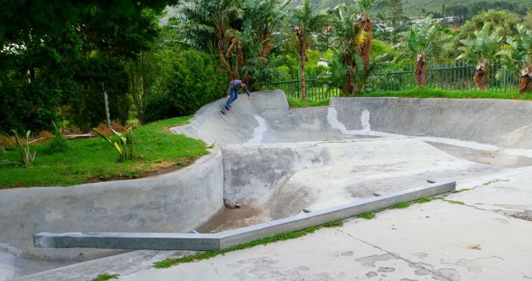 Person Skateboarding in Concrete Skatepark - Free Images, Stock Photos and Pictures on Pikwizard.com