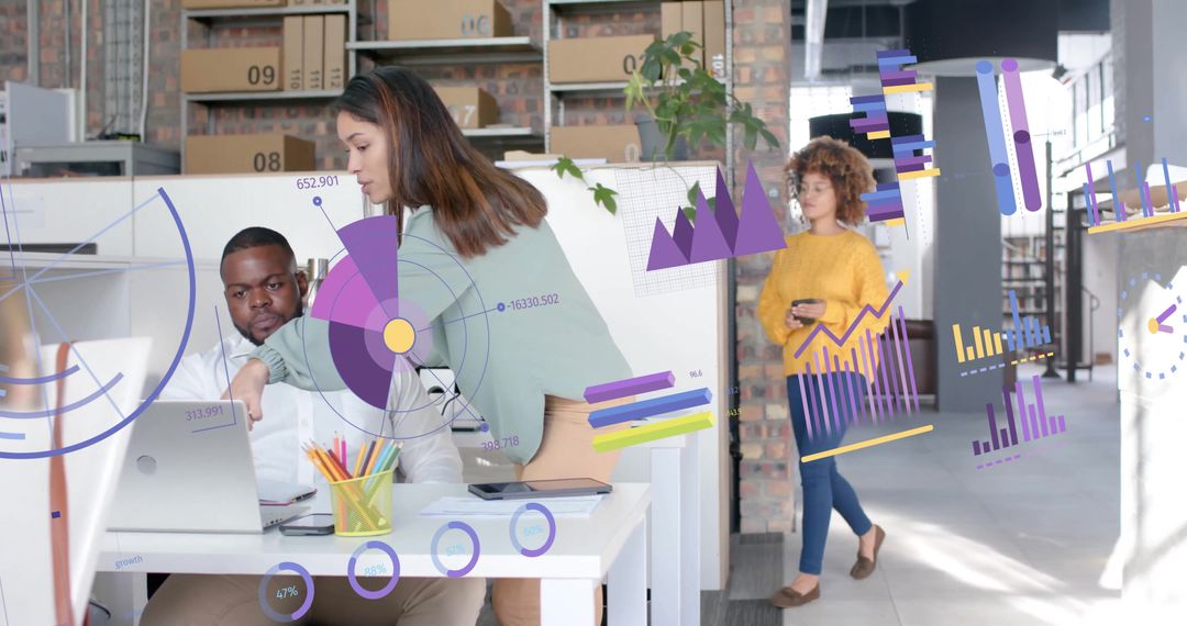 Team Analyzing Financial Data with Digital Graphs in Modern Office