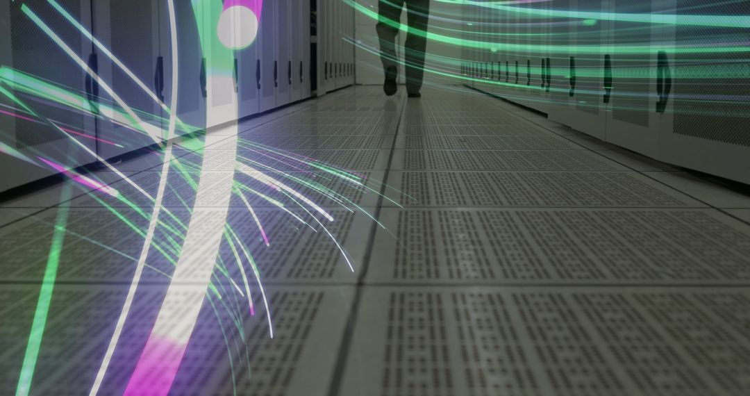 Lone IT Technician Navigating High-Tech Data Center with Light Streaks