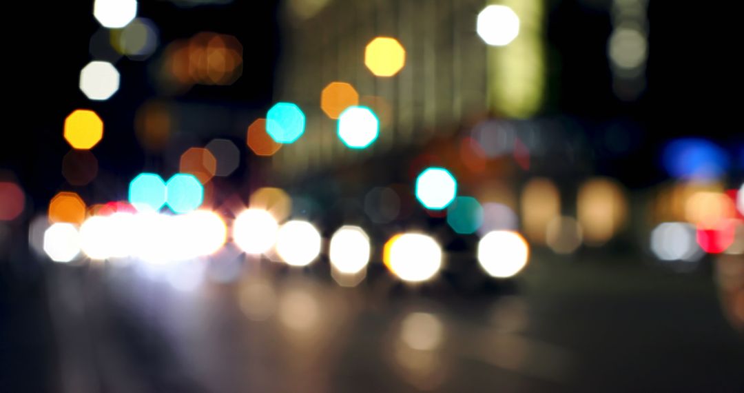 Vibrant bokeh lights of nighttime urban street