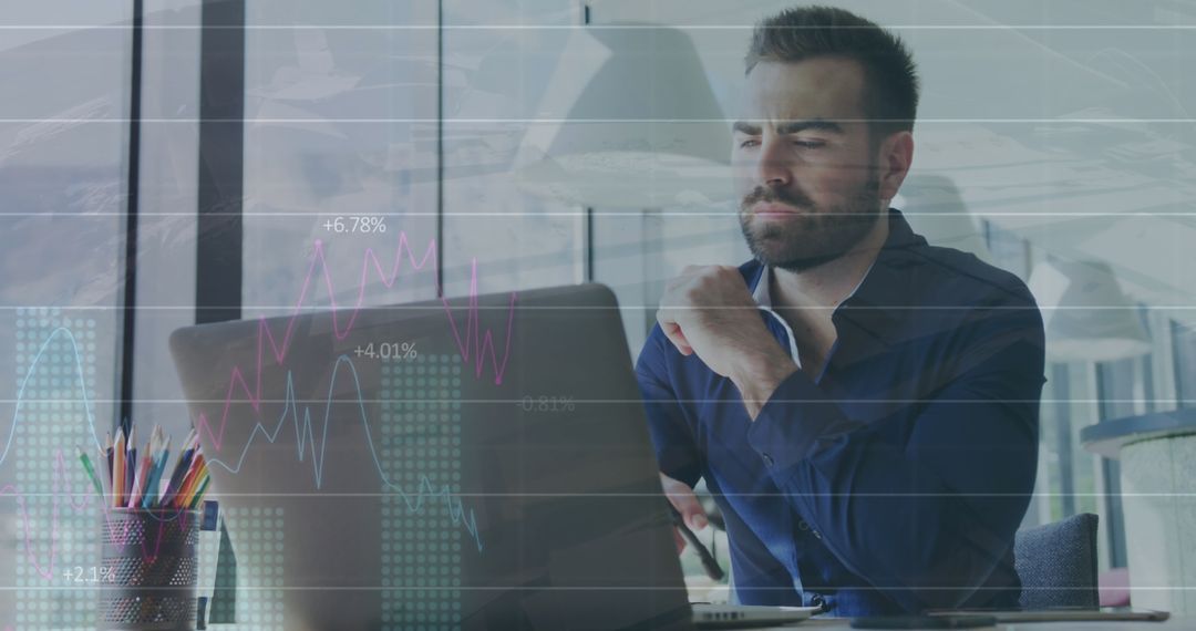 Entrepreneur Analyzing Graphs in Modern Office Environment