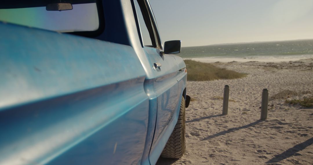 Blue Vintage Truck Parked by Beach on Sunny Day - Free Images, Stock Photos and Pictures on Pikwizard.com