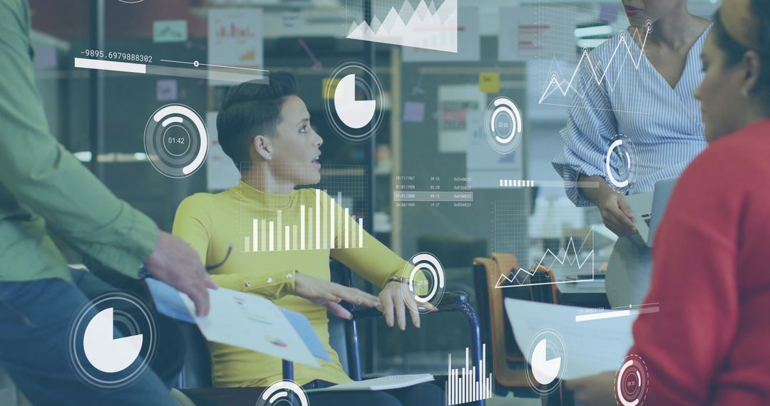 Disabled Professionals Collaborating in Modern Workspace with Data Technology