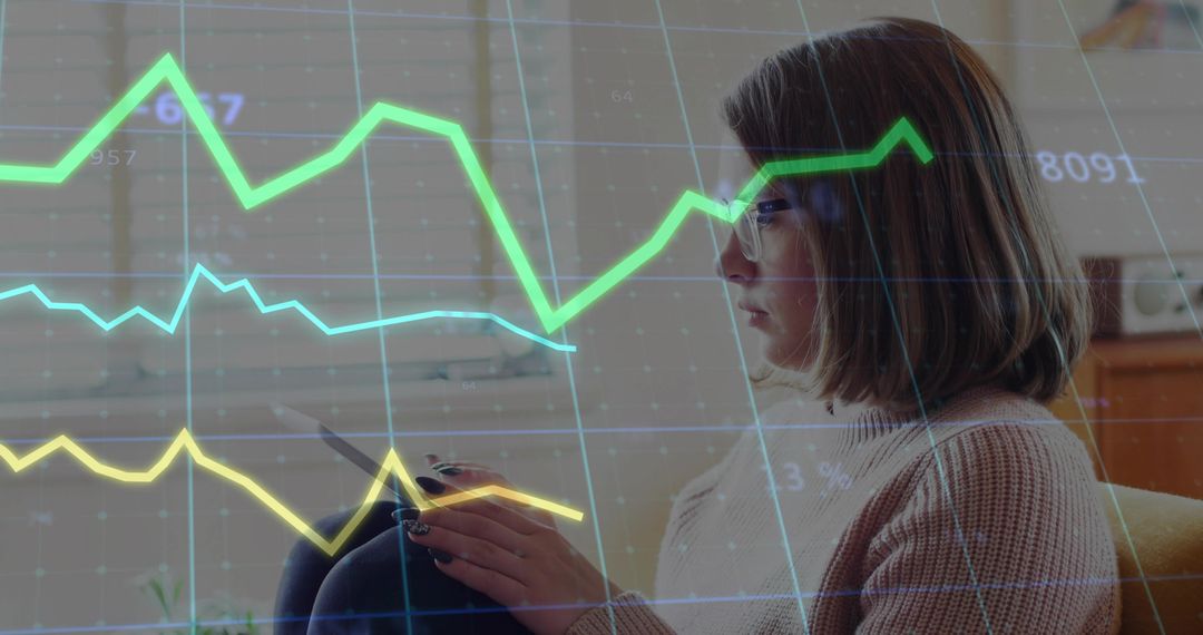 Woman Analyzing Graph on Digital Tablet at Home