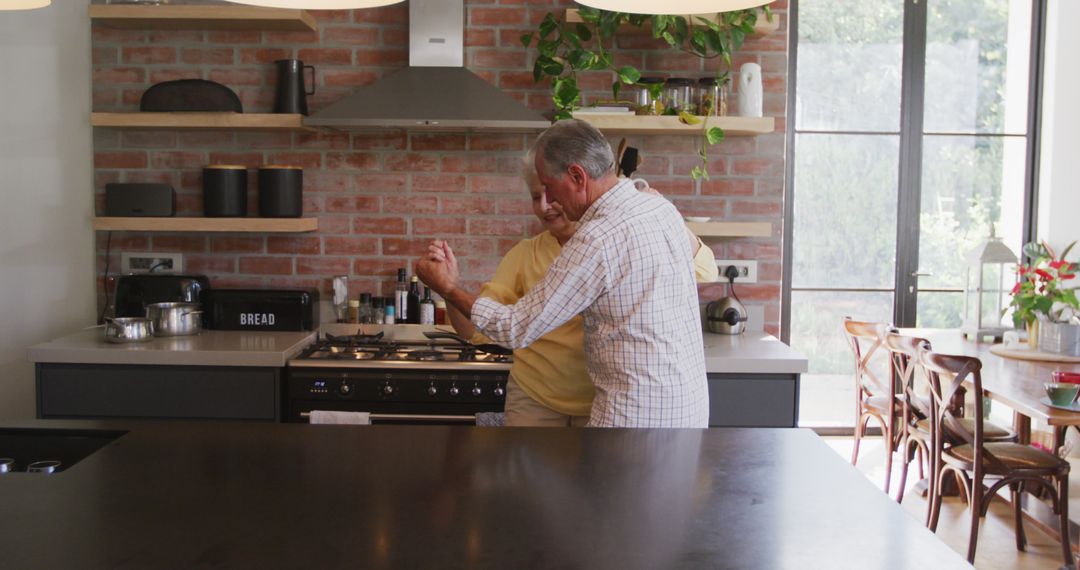 Senior Couple Dancing in Modern Rustic Kitchen