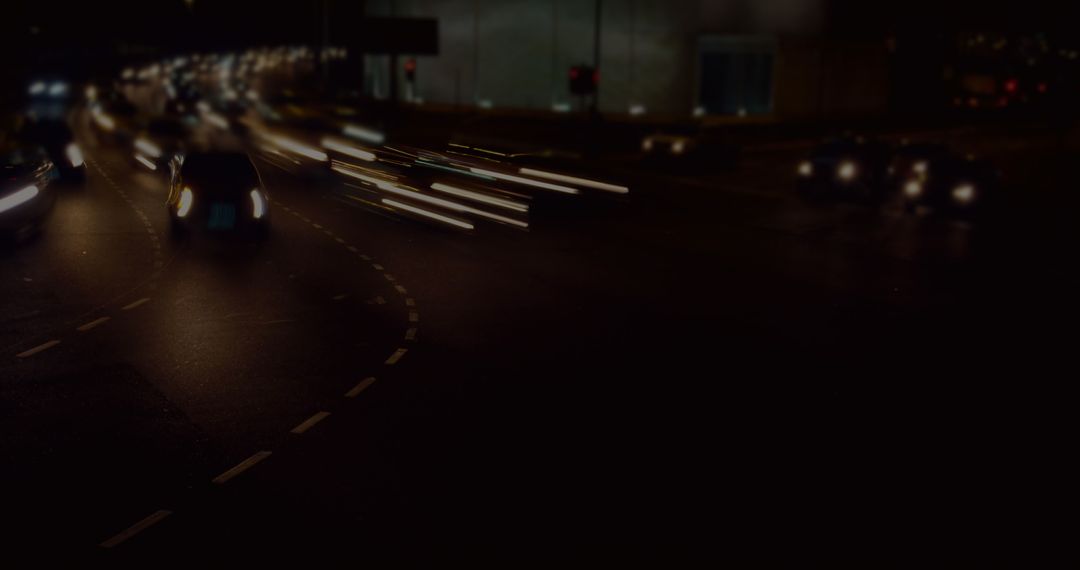 Blurred Traffic in Night City with Motion Light Trails