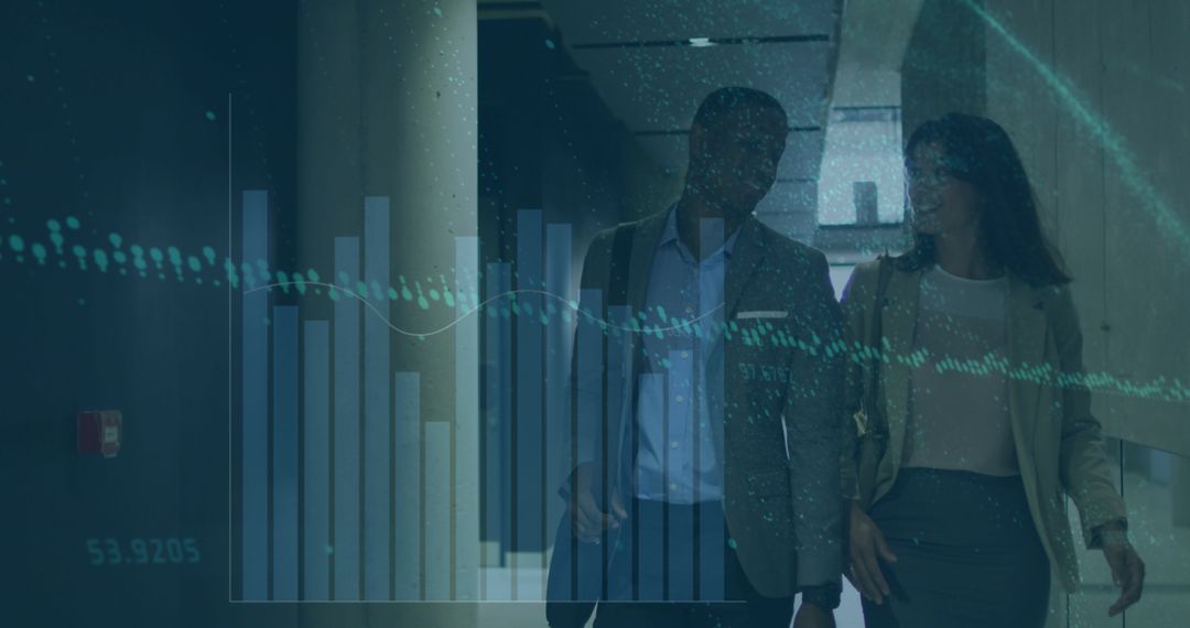 Colleagues Analyzing Data Projections in Modern Office Corridor