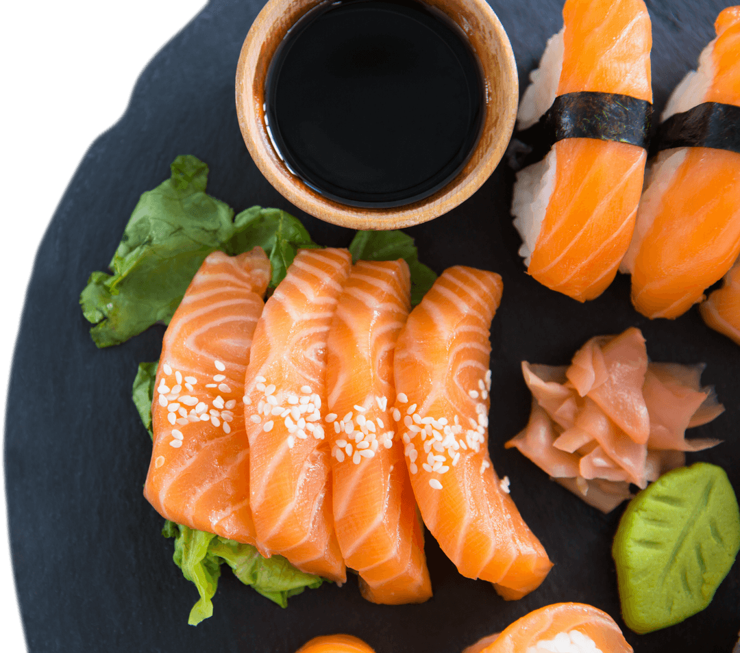 Assorted Sushi Platter on Black Slate with Soy Sauce and wasabi on Transparent Background