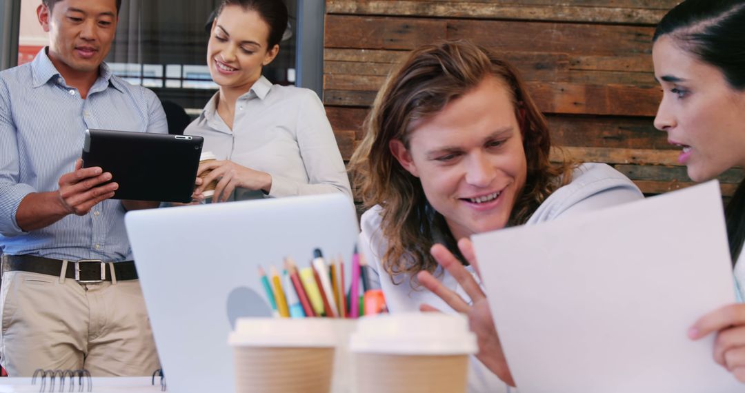 Diverse Colleagues Collaborating at Modern Workplace