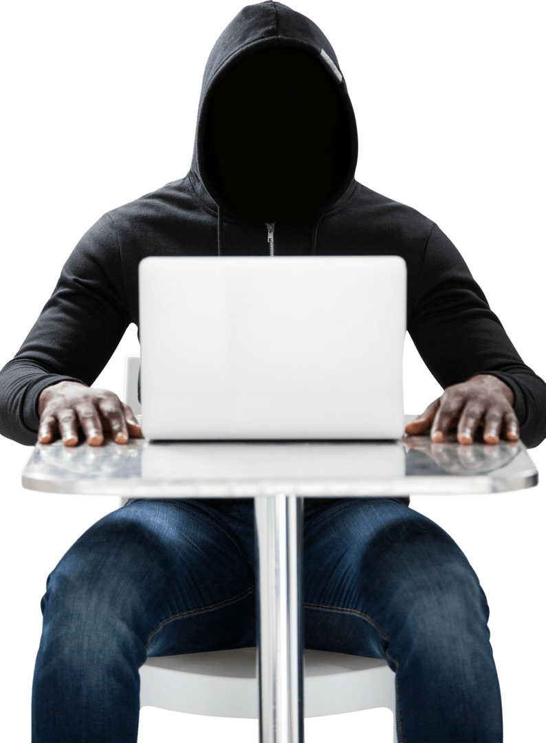 Hacker in Black Hoodie Using Laptop at Table on Transparent Background