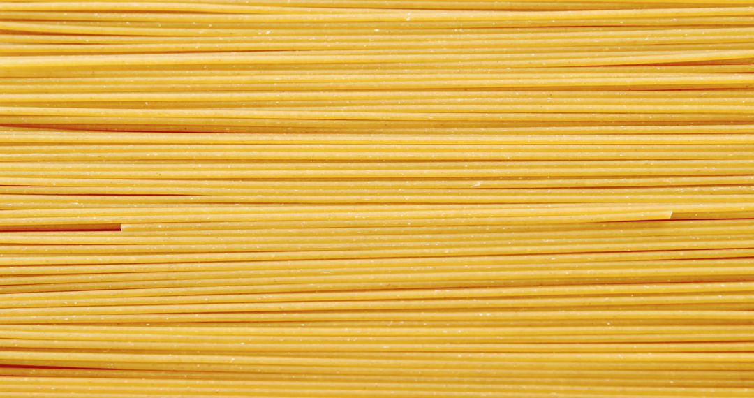 Close-Up of Uncooked Spaghetti Noodles in Rows - Free Images, Stock Photos and Pictures on Pikwizard.com