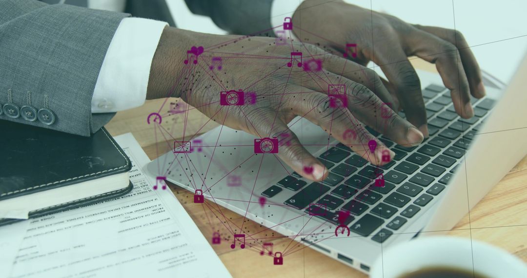 Typing hands on laptop with magenta digital network overlay boosting business productivity