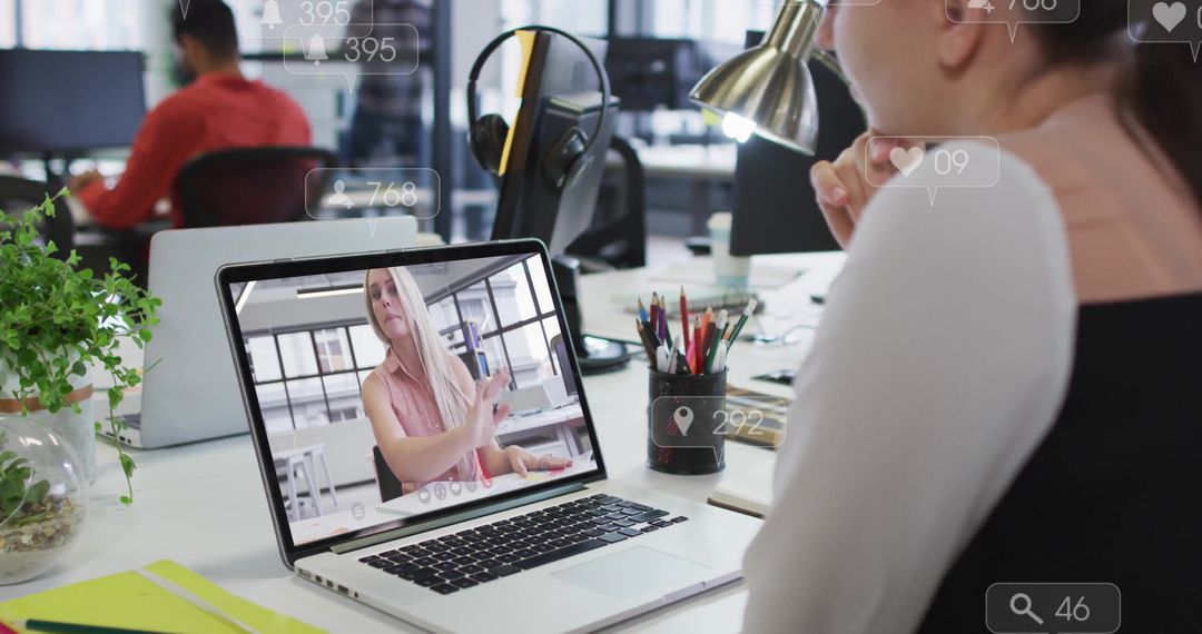 Professional Collaboration via Video Call in Modern Office Environment