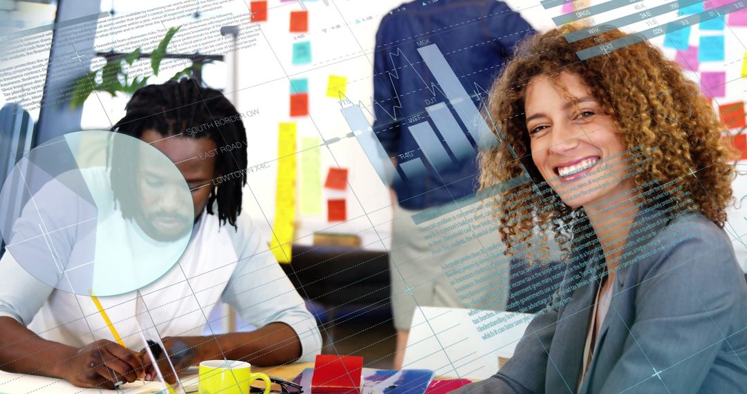 Innovative Team Analyzing Digital Financial Data in Bright Office