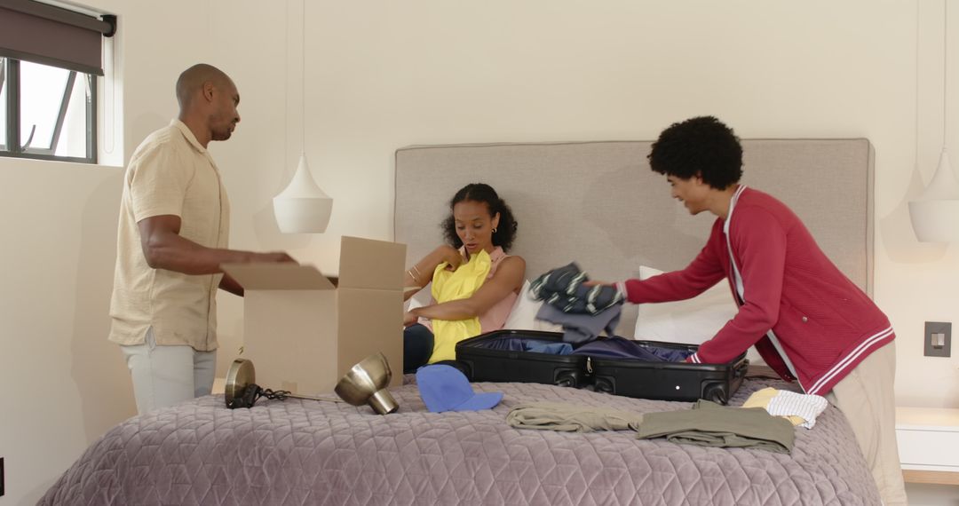 Family Packing for Vacation Experience in Cozy Bedroom