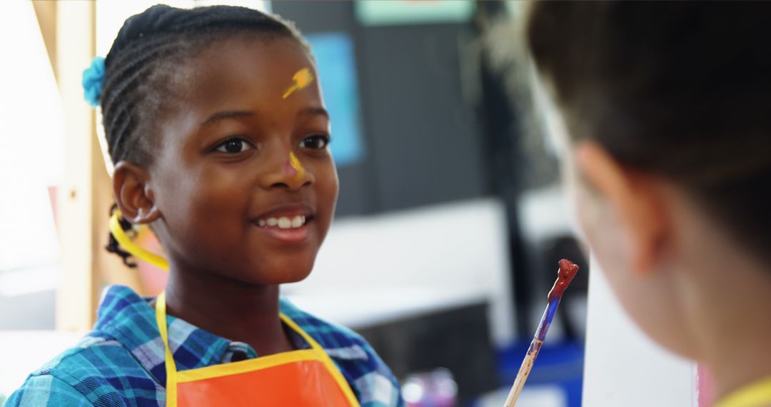 Creative African American Girl Smiling While Painting in Art Class - Free Images, Stock Photos and Pictures on Pikwizard.com