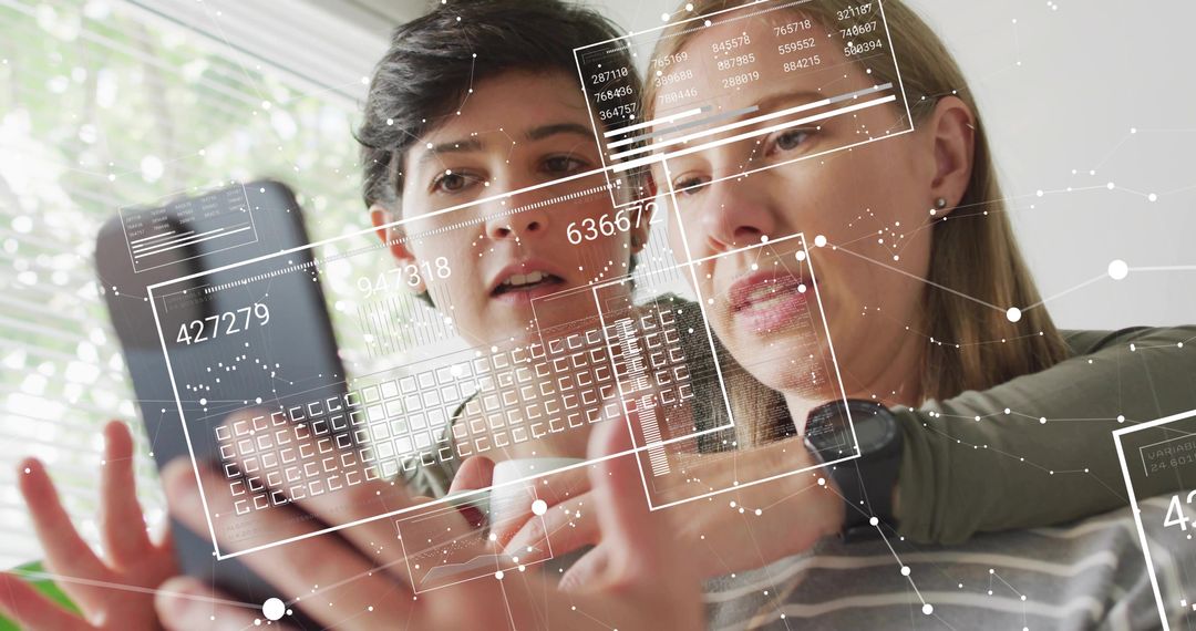 Women Collaborating on Smartphone with Augmented Reality Interface and Data Overlay