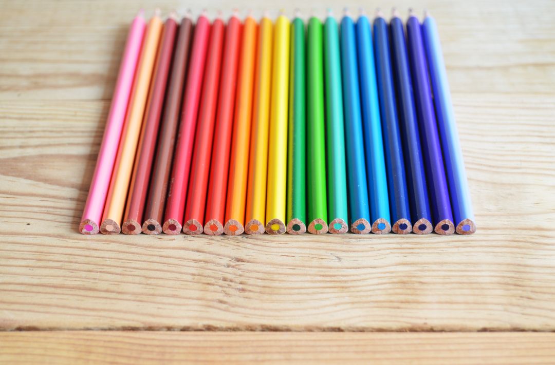 Colorful Pencils Arranged in Rainbow Order on Wooden Table - Free Images, Stock Photos and Pictures on Pikwizard.com