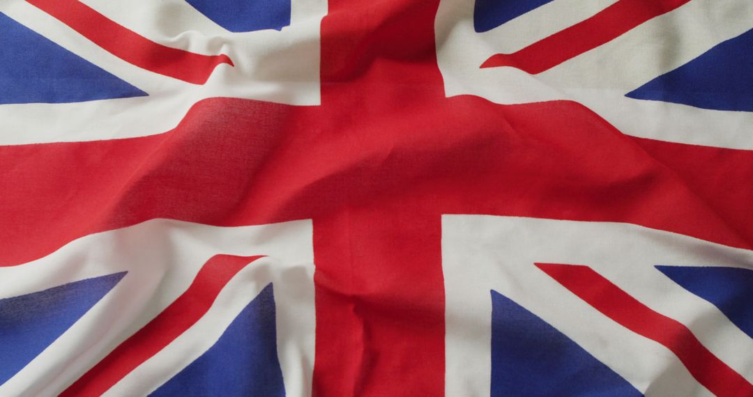 Image of creased flag of great britain lying on white background - Free Images, Stock Photos and Pictures on Pikwizard.com