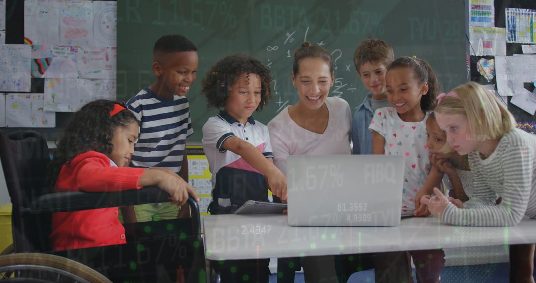 Diverse Elementary Classroom with Laptops and Teachers