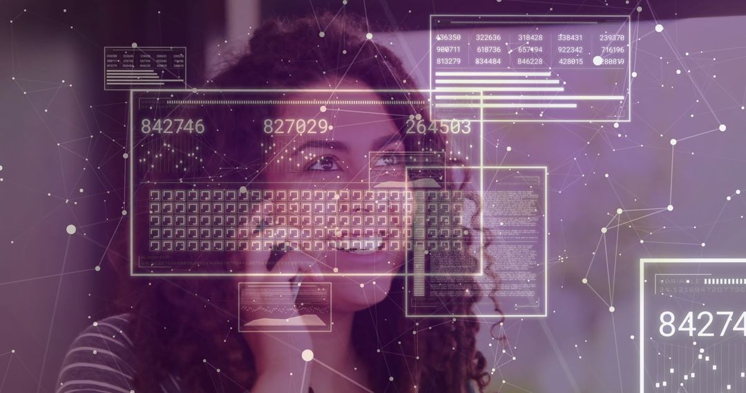 Woman at Desk Interacting with Virtual Data Display Technology