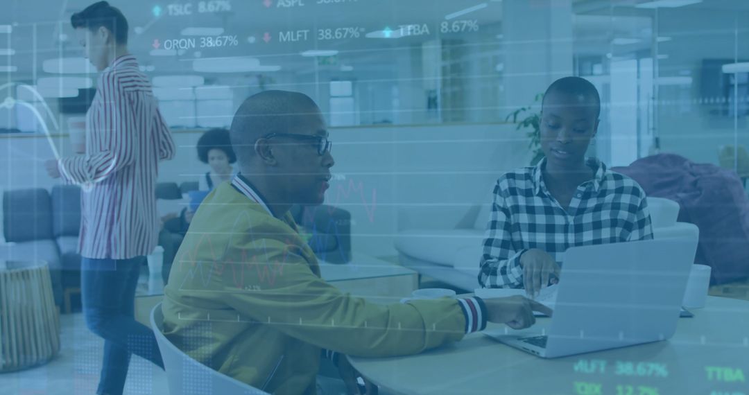 Corporate Team Analyzing Financial Data in Modern Office