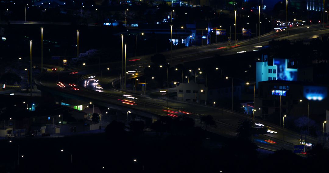 Beautiful Urban Night Traffic on Multiple Highways with Motion Blur - Free Images, Stock Photos and Pictures on Pikwizard.com