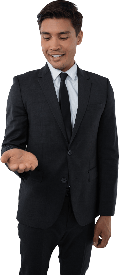 Smiling Businessman Inspecting Open Palm Gesture on Transparent Background