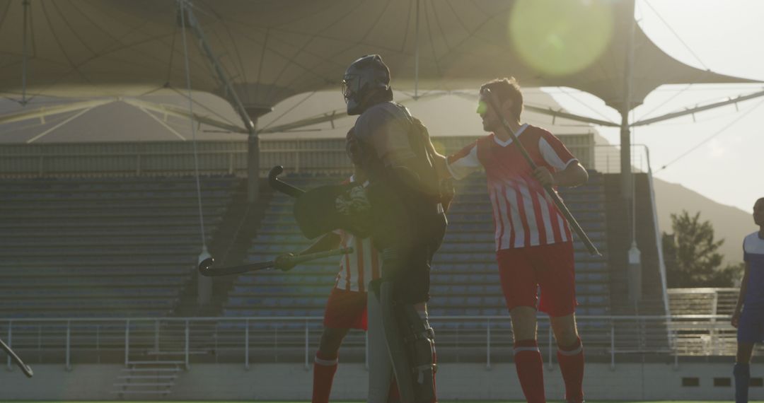 Field Hockey Team Celebrating Goal Victory During Game - Free Images, Stock Photos and Pictures on Pikwizard.com