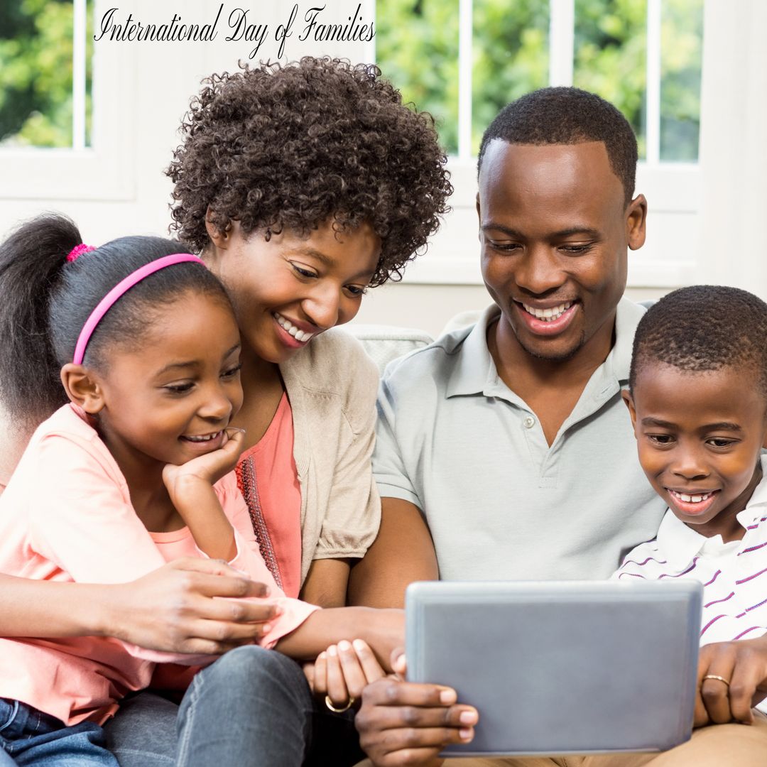Happy Family Using Tablet for International Day of Families