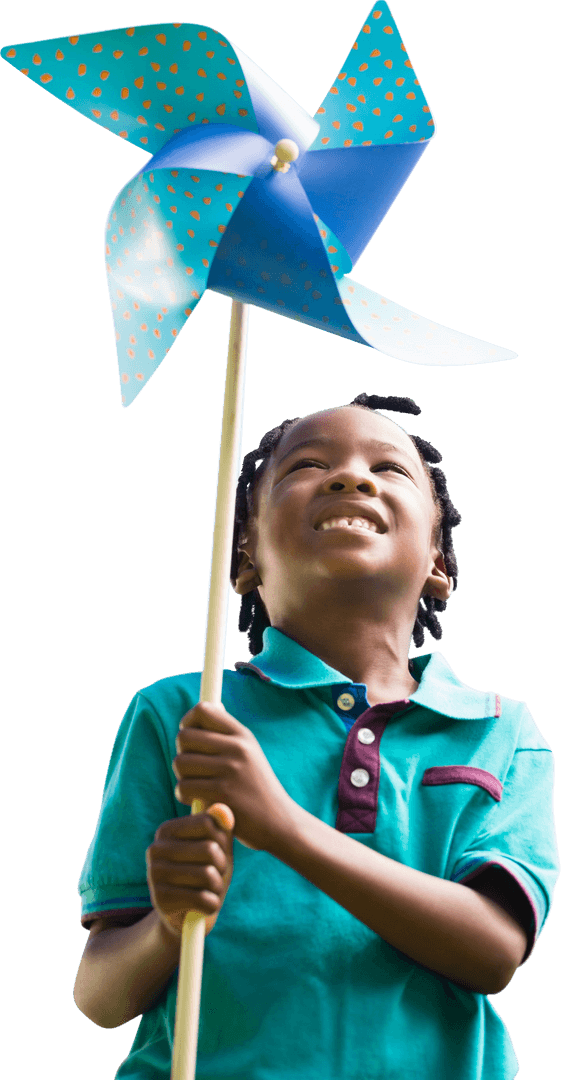 Transparent Image of Boy Happily Holding Blue Polka Dot Pinwheel