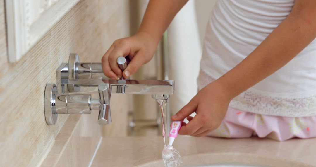 Child Learning to Brush Teeth at Bathroom Sink - Free Images, Stock Photos and Pictures on Pikwizard.com