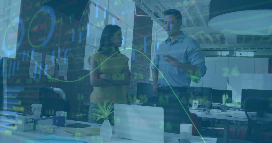 Team Reviewing Financial Charts in Modern Office