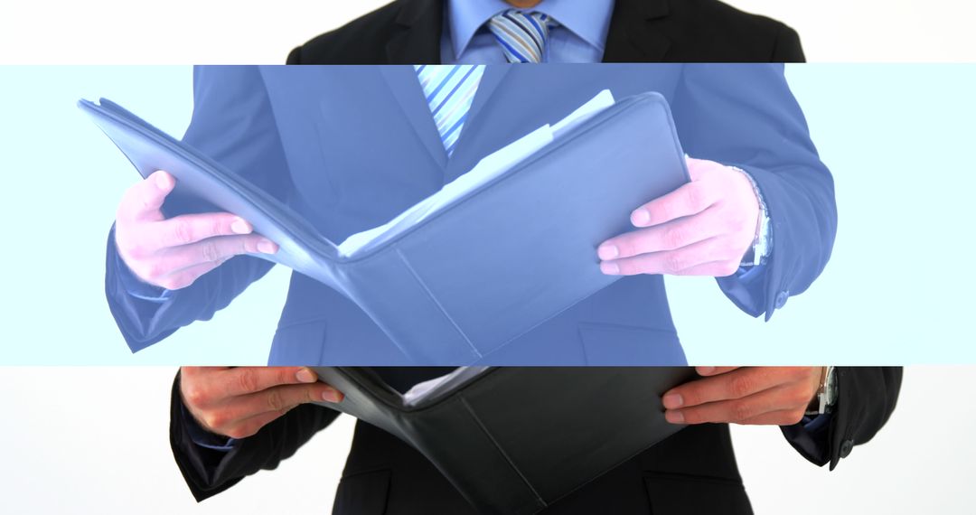 Businessman Reviewing Documents in Suit and Tie - Free Images, Stock Photos and Pictures on Pikwizard.com