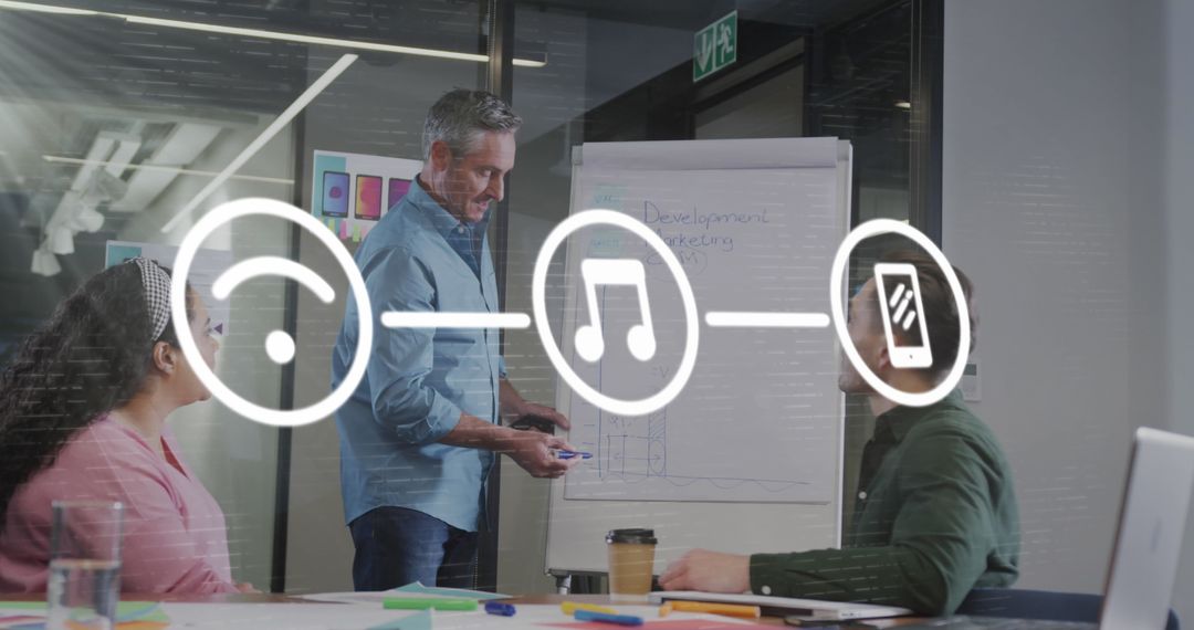 Diverse Team Discussing Multimedia Strategy in Modern Office