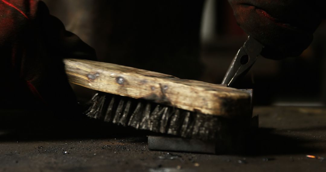 Close-Up of Worker Cleaning Metal with Wire Brush - Free Images, Stock Photos and Pictures on Pikwizard.com