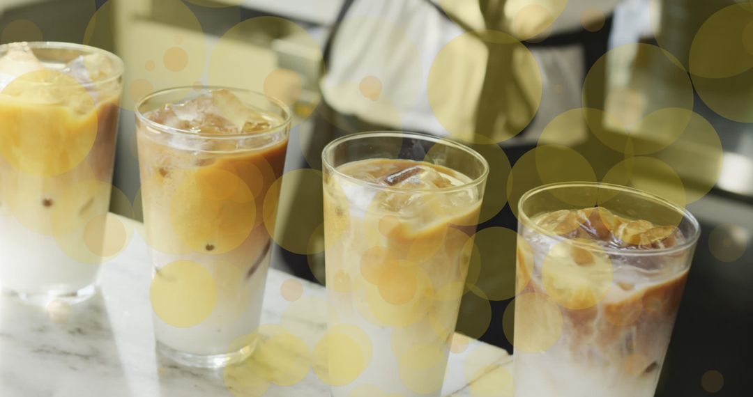 Refreshing Iced Coffee Drinks with Abstract Yellow Circles