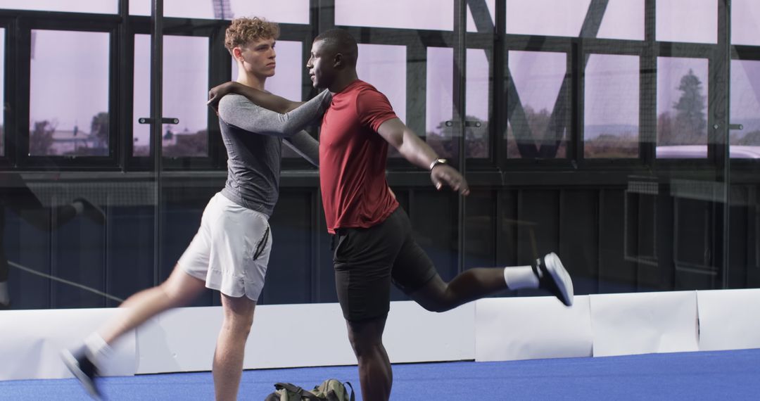 Diverse Male Dancers Practicing Partnered Dance Routine