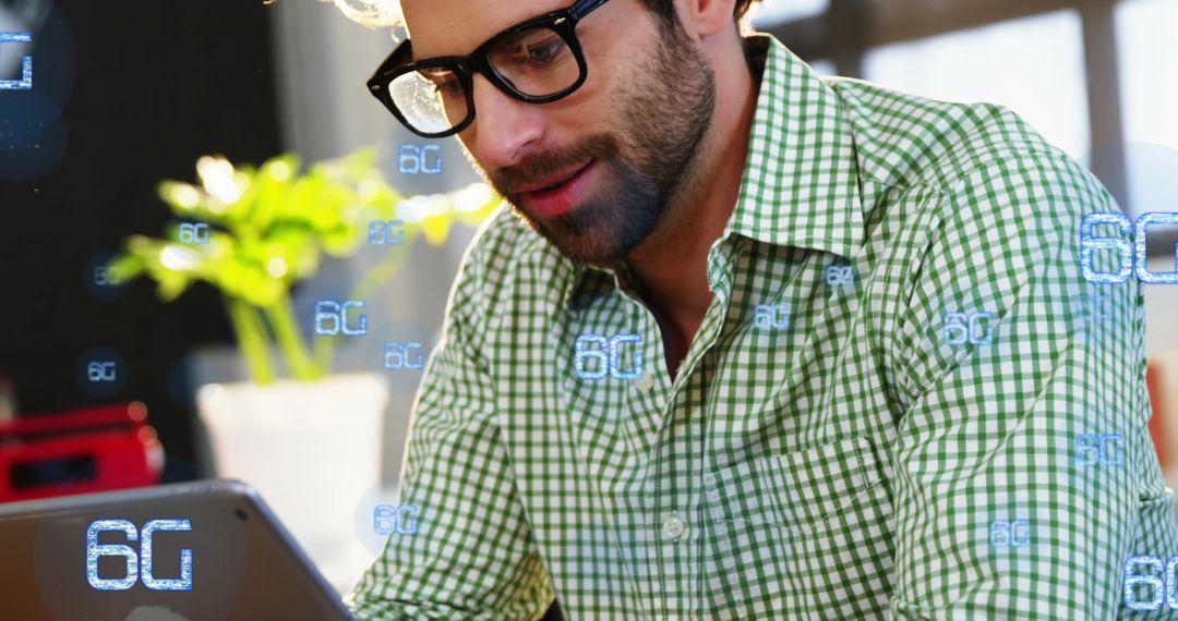 Man Exploring Emerging 6G Network Technology in Modern Cafe